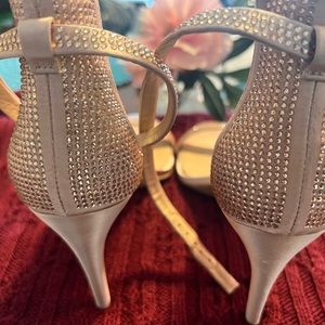 Nude w hint of mauve heel sandals, Red & pink heart on strap across toes.